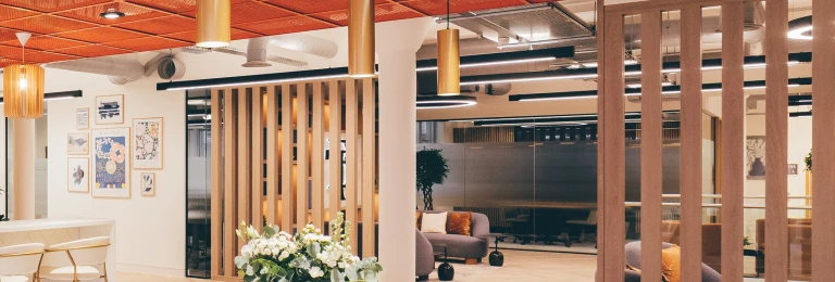 Manchester's Tootal Building renovated private offices featuring Banker WD-268 welded wire mesh as an accent ceiling feature.